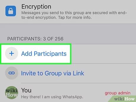 How do you address someone in a group on WhatsApp