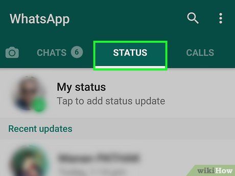 How do I upload a status on Whatsapp