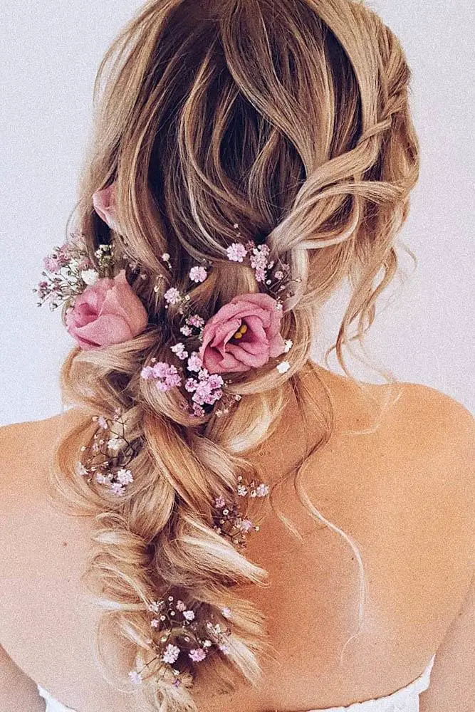 How to wear flowers in plaited bridal hairstyles