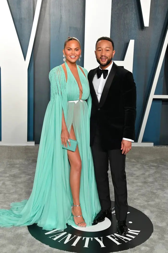 Chrissy Teigan + John Legend in Georges Hobeika  & Gucci...